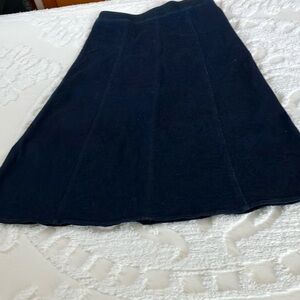Dark wash midi denim skirt. 98%cotton and 2% spandex. Like new.